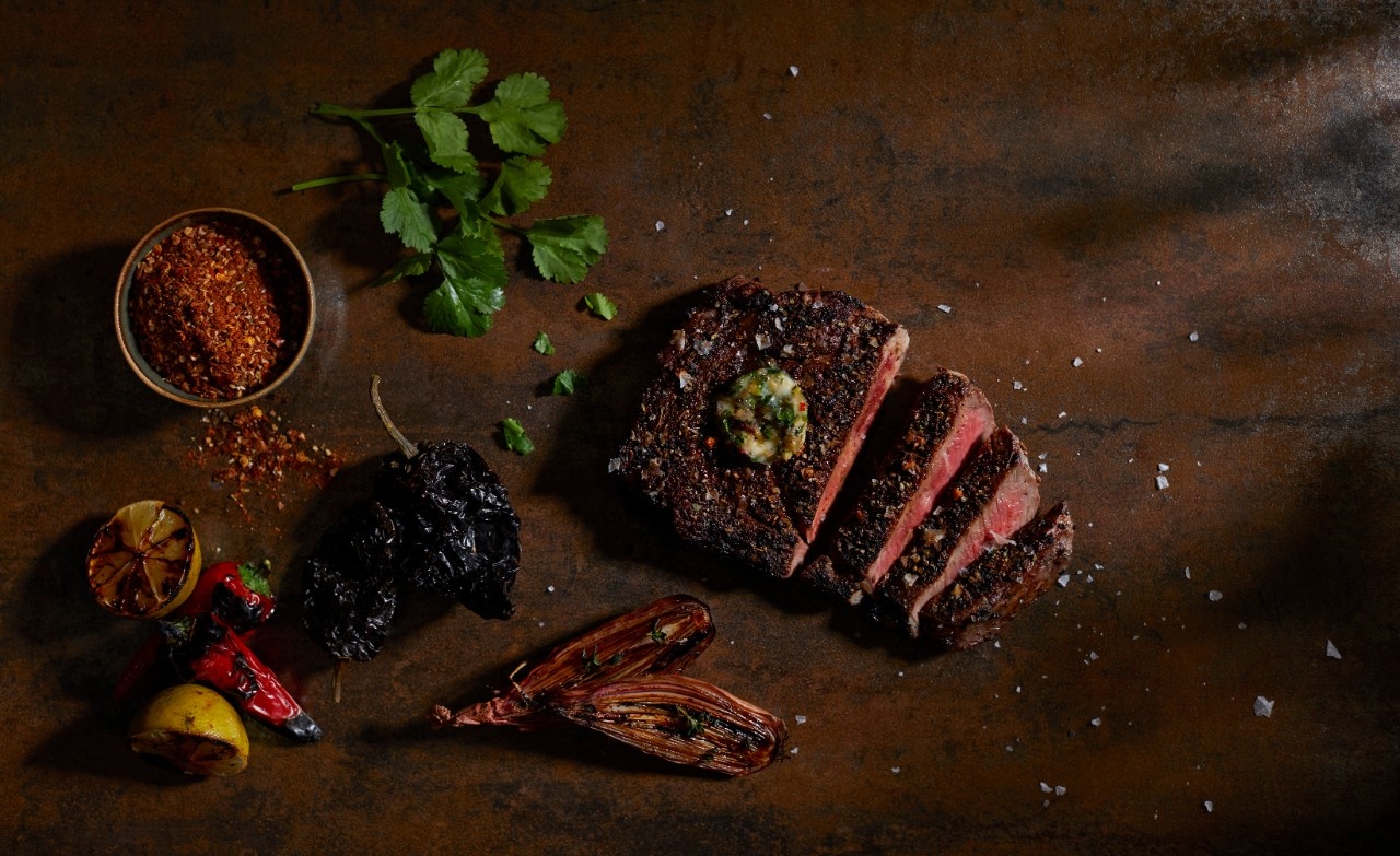  Chilli rubbed ribeye steak with lime and coriander butter


